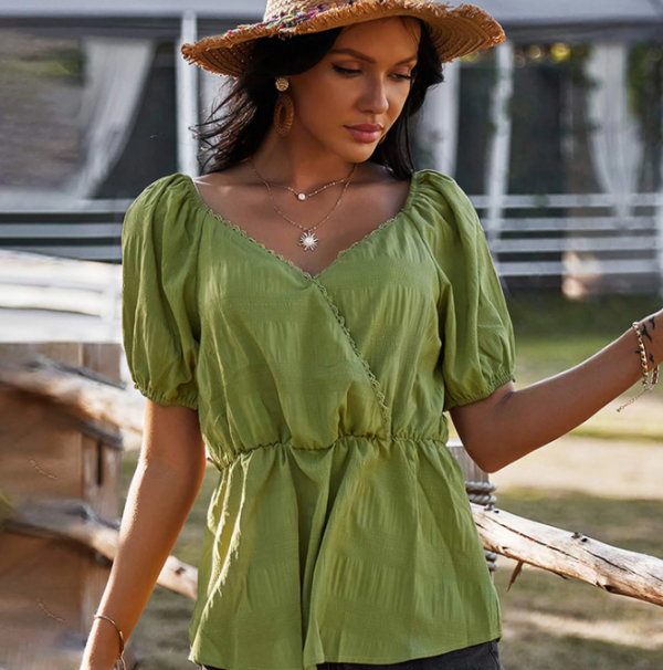 Atasan dengan lengan buntal